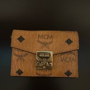 MCM card holder with zipper and pouch for coins. Excellent condition.